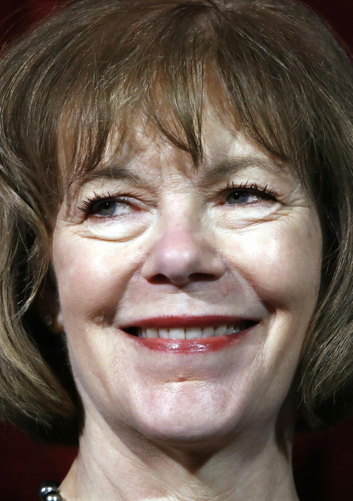 Sen. Tina Smith, D-Minn., smiles after being administered the Senate oath of office during a mock swearing in ceremony with Vice President Mike Pence in the Old Senate Chamber, Wednesday, Jan. 3, 2018 on Capitol Hill in Washington. (AP Photo/Jacquelyn Martin)