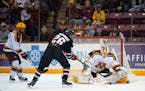 Gophers goalie Jack LaFontaine denied St. Cloud State's Easton Brodzinski during Minnesota's victory in the Mariucci Classic championship game.