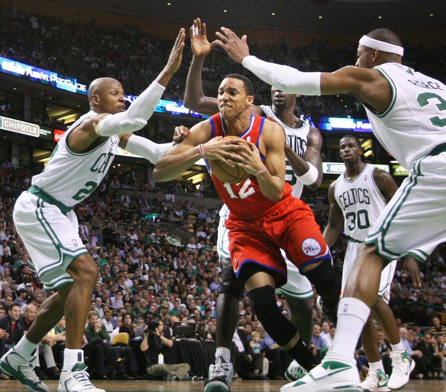 Philadelphia 76ers' Evan Turner drives between Boston Celtics' Ray Allen,left, and Paul Pierce during Game 5 of the NBA Eastern Semifinals on Monday, May 21, 2012 at TD Garden in Boston, Massachusetts.