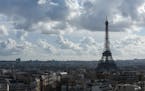 The Eiffel Tower is pictured from the top of the Arc de Triomphe, Monday, Feb. 12, 2024 in Paris.