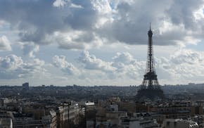 The Eiffel Tower is pictured from the top of the Arc de Triomphe, Monday, Feb. 12, 2024 in Paris.