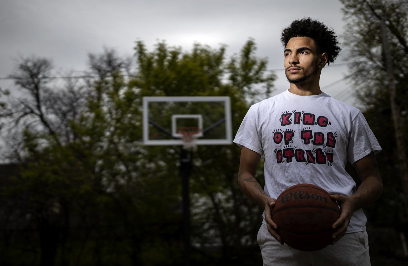 North High School football and basketball player C.J. Brown. ] CARLOS GONZALEZ • cgonzalez@startribune.com – Minneapolis, MN – May 13, 2020, C.J. Brown, a Mpls resident and North High student who plays football and basketball, coping with the pandemic and without sports not long after losing his dad.