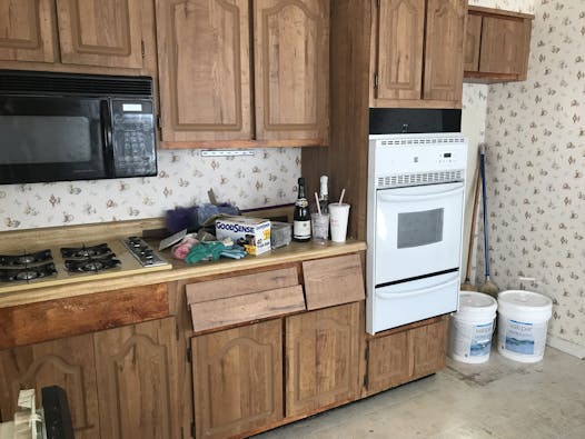 The same kitchen — before a little paint.