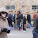 Pro-life protestors, who chose to demonstrate on Good Friday, carry a giant cross outside during Planned Parenthood's Solidarity Day.
