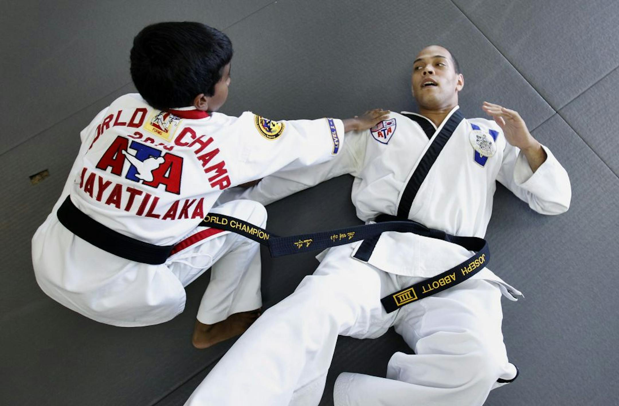 Agasthi Jayatilaka, 13, worked out with Joe Abbott at the ATA Black Belt Academy in Burnsville. The small taekwondo studio has produced a number of world champions, including Agasthi, a 2010 ATA world champion.