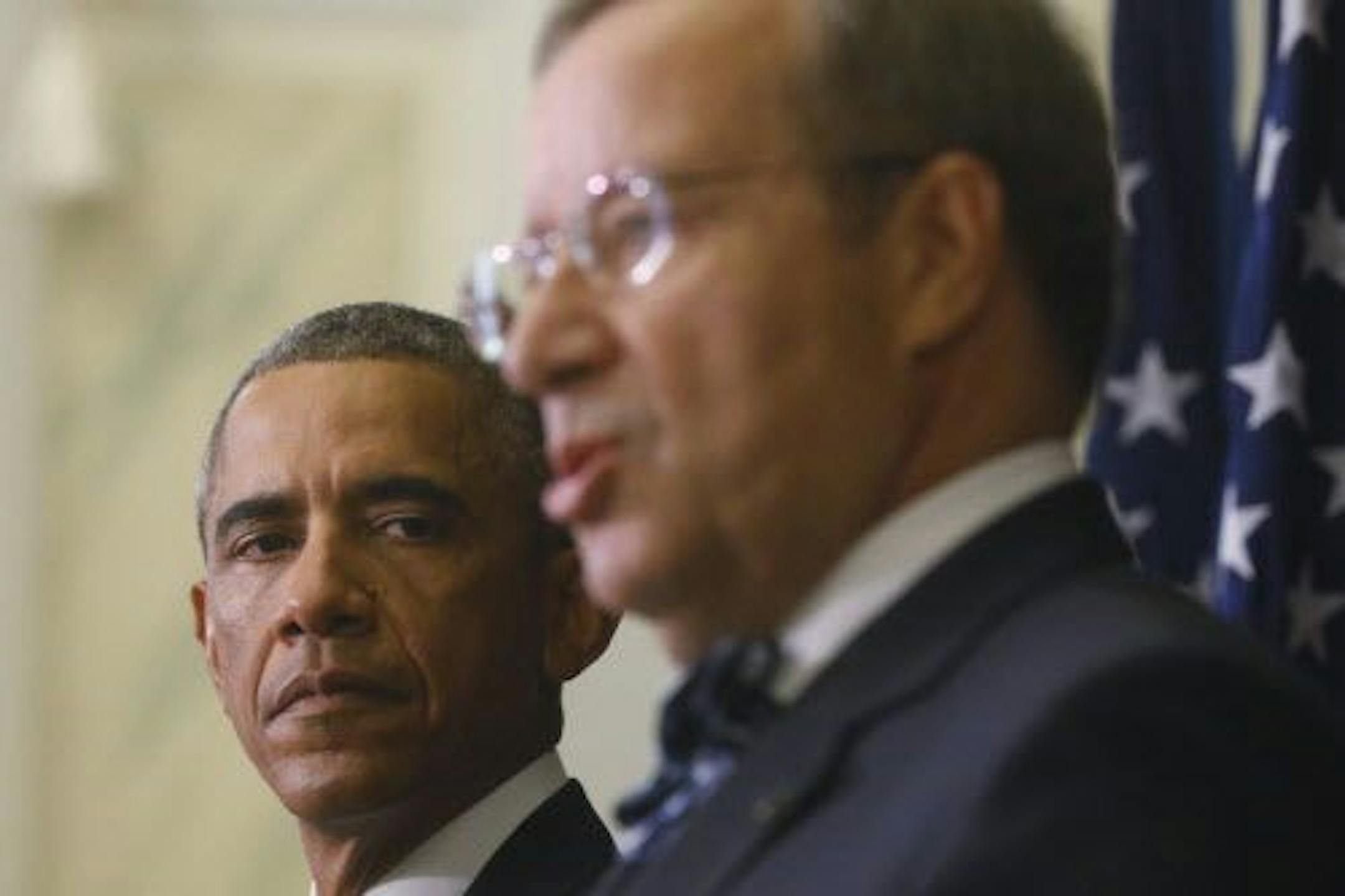 U.S. President Barack Obama, left, listens to Estonian President Toomas Hendrik Ilves speak during a news conference at the Bank of Estonia in Tallinn, Estonia, Wednesday, Sept. 3, 2014.