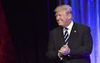 President Donald Trump walks on stage to speak at a fundraiser at Cipriani in New York, Saturday, Dec. 2, 2017. Trump is attending a trio of fundraise