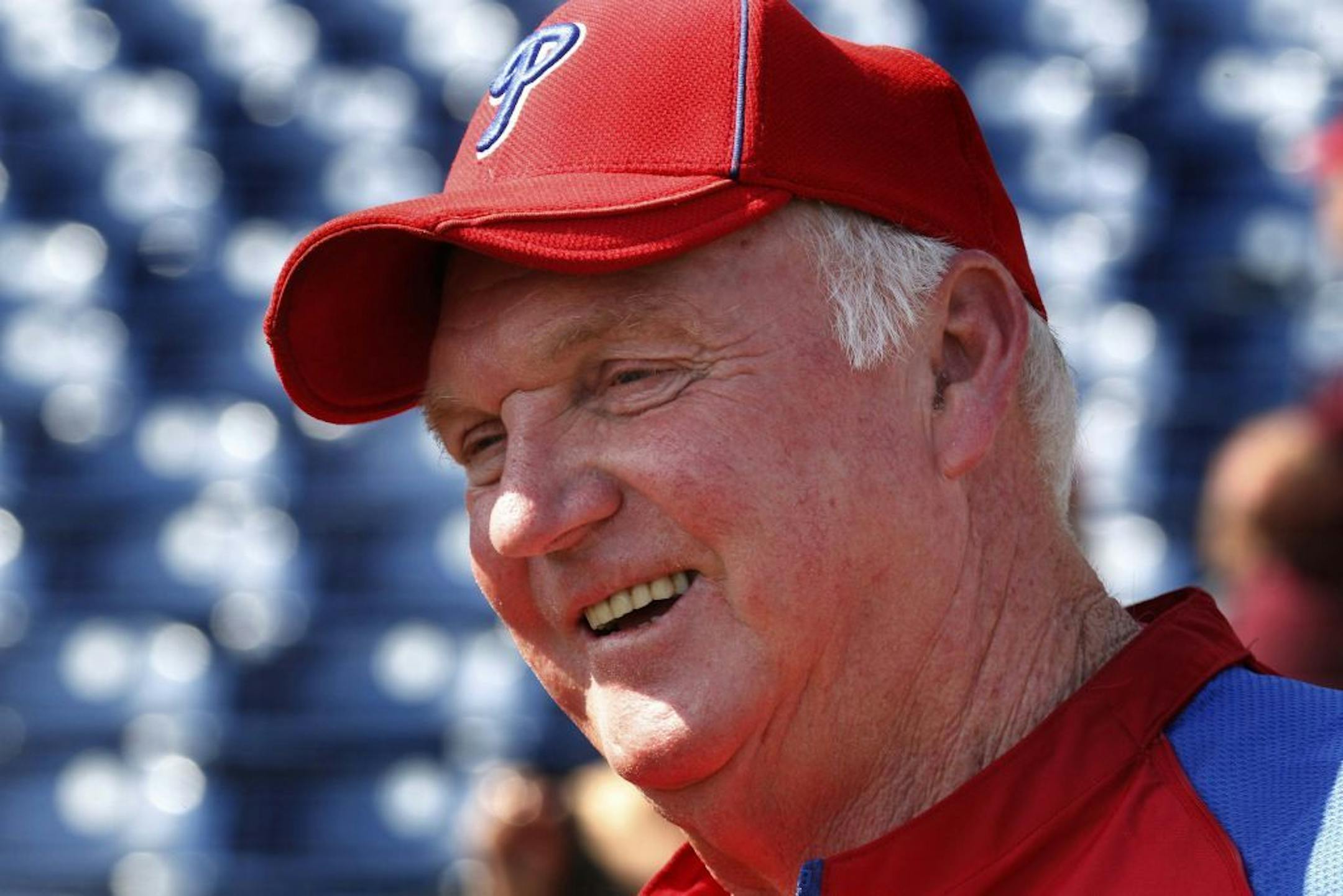 Philadelphia Phillies manager Charlie Manuel watches batting practice before a spring training baseball game against the Minnesota Twins in Clearwater, Fla., Thursday, March 24, 2011