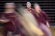 University of Minnesota volleyball head coach Keegan Cook watches over the team during practice Monday, Aug. 14, 2023 at the Maturi Pavilion in Minnea