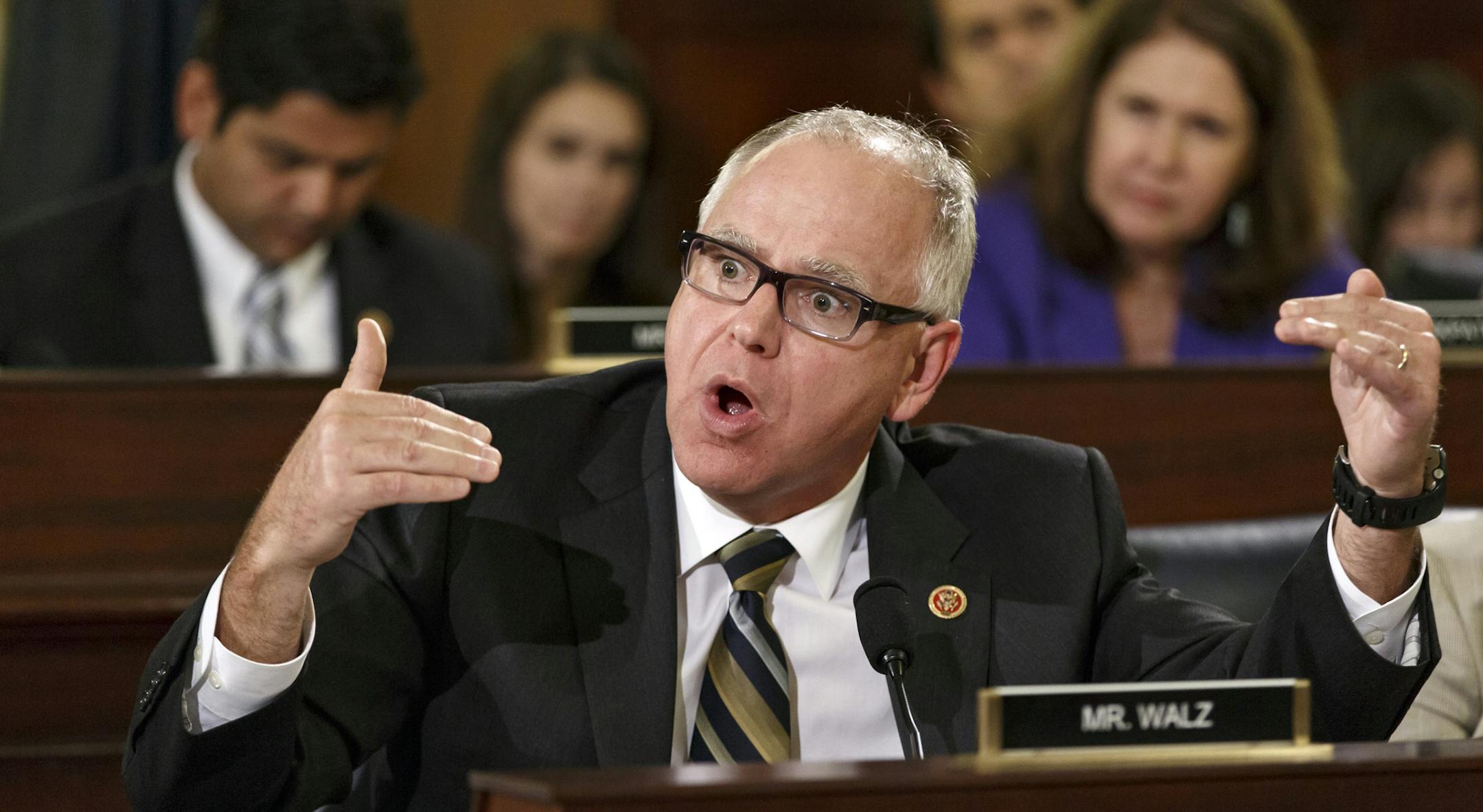 Rep. Tim Walz, D-Minn., a member of the House Committee on Veterans' Affairs, questions witnesses from the Department of Veterans Affairs as the panel investigates allegations of gross mismanagement and misconduct at VA hospitals possibly leading to patient deaths, on Capitol Hill in Washington, Wednesday, May 28, 2014. (AP Photo/J. Scott Applewhite)