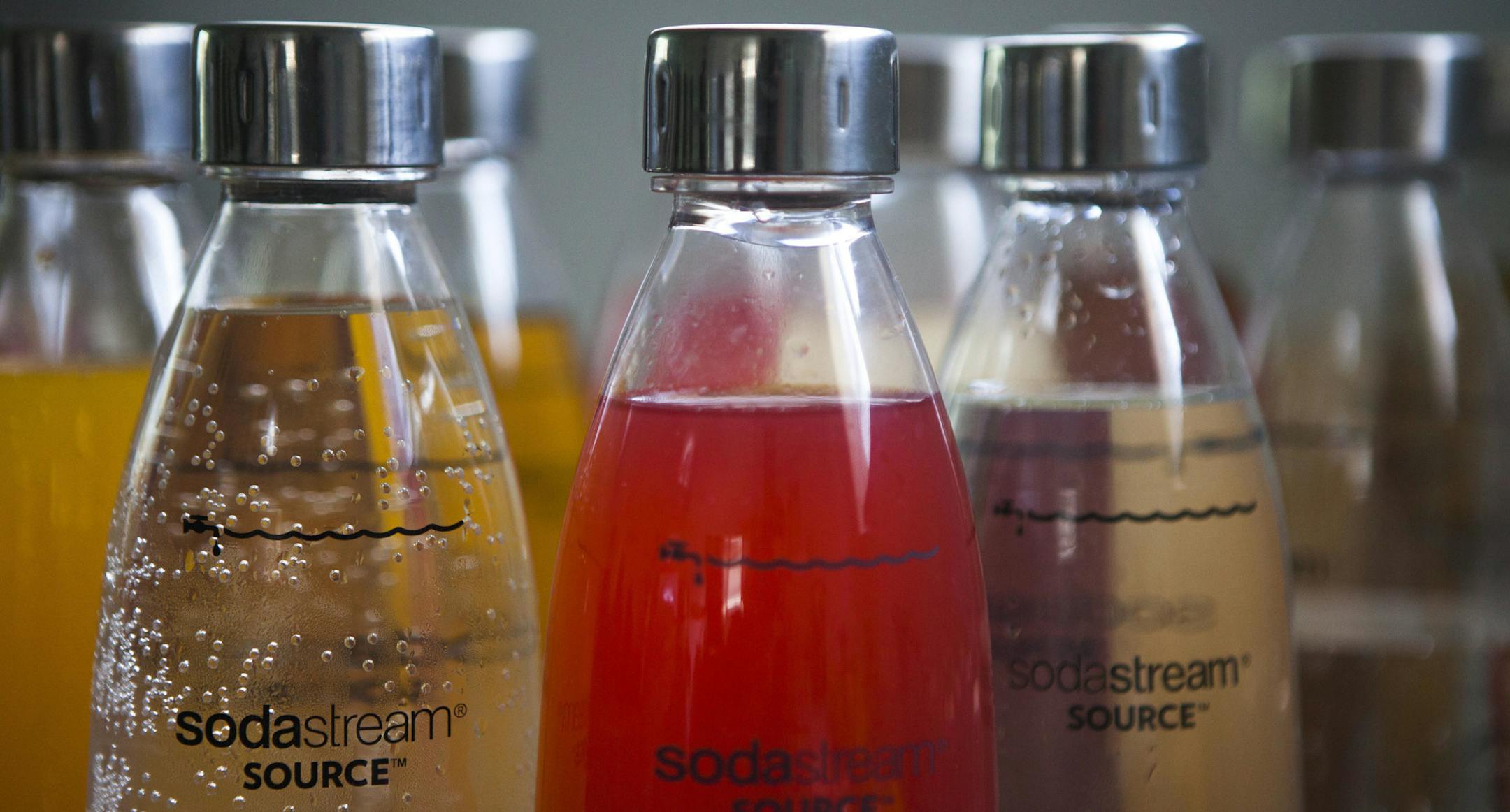 FILE - In this Sept. 2, 2015 file photo, SodaStream products are seen at the SodaStream factory near the Bedouin city of Rahat, Southern Israel. Beverage giant PepsiCo has bought Israel's fizzy drink maker SodaStream for $3.2 billion. PepsiCo said on Monday, Aug. 20, 2018, that it is acquiring all SodaStream's outstanding shares at $144 per share, a 32 percent premium to the 30-day volume weighted average price. (AP Photo/Dan Balilty, File)