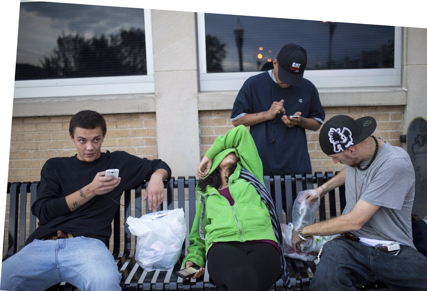 From left, Deante Brown, Yana Miller, J.D. (last name withheld) and Stephen Rose passed time on a park bench near the Anoka City Hall Dam Thursday night. ] Aaron Lavinsky &#x2022; aaron.lavinsky@startribune.com Suburbs across the metro are now opening an array of new services for young people facing homelessness. Dakota County has opened a new drop-in center where young adults can take a shower, grab a meal, etc. Last week the Coon Rapids planning commission unanimously approved Hope4Youth's pla