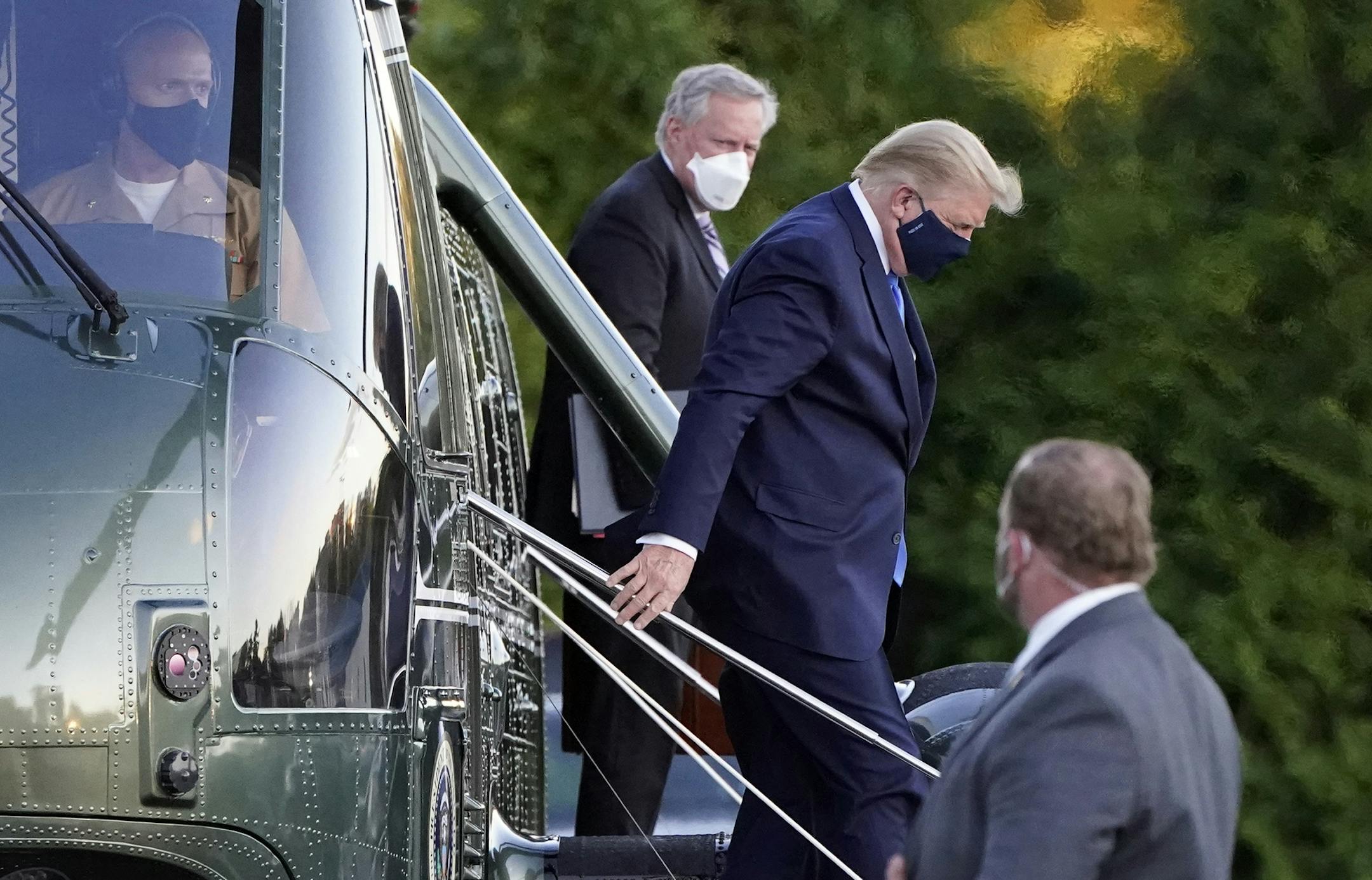 President Donald Trump arrives at Walter Reed National Military Medical Center, in Bethesda, Md., Friday, Oct. 2, 2020, on Marine One after he tested positive for COVID-19. (AP Photo/Jacquelyn Martin)