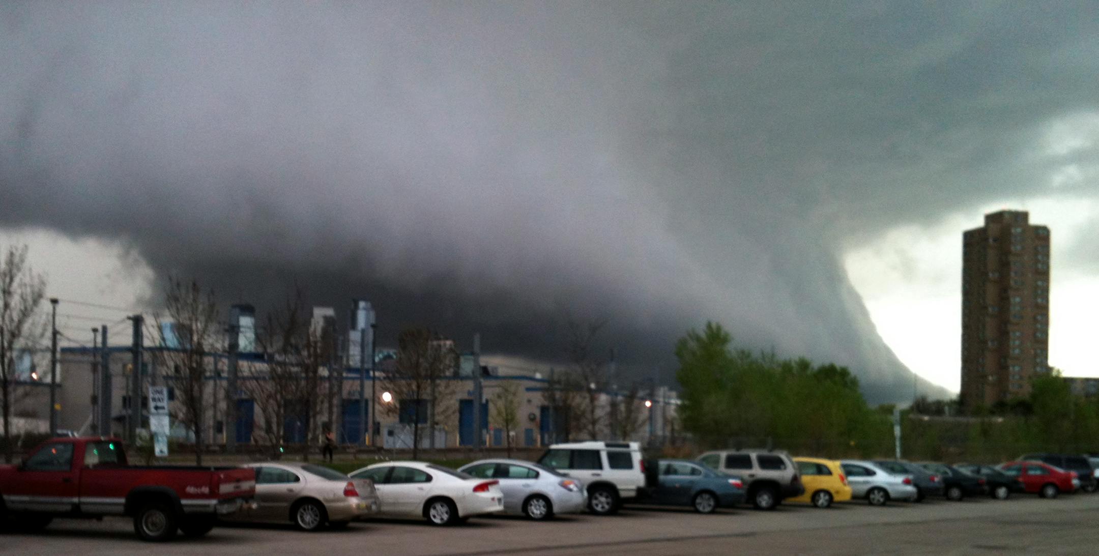 An impressive dark cloud is seen from Cedar Av / I-94 area about 7 p.m Sunday. Despite the frightening appearance, no tornadoes were reported in the Twin Cities.