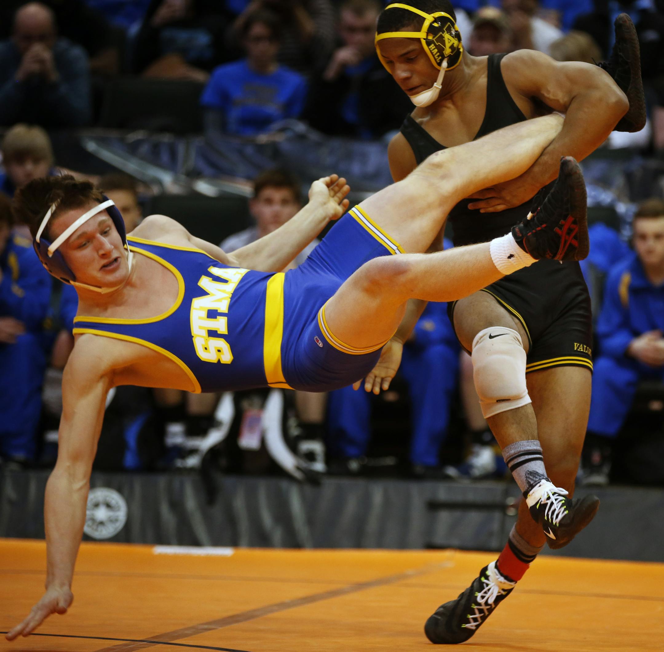 At the State Wrestling team finals in Class AAA, Mark Hall of Apple Valley beat Lucas Jeske in the 182 lbs. class .] Richard Tsong-Taatarii/rtsong-taatarii@startribune.com