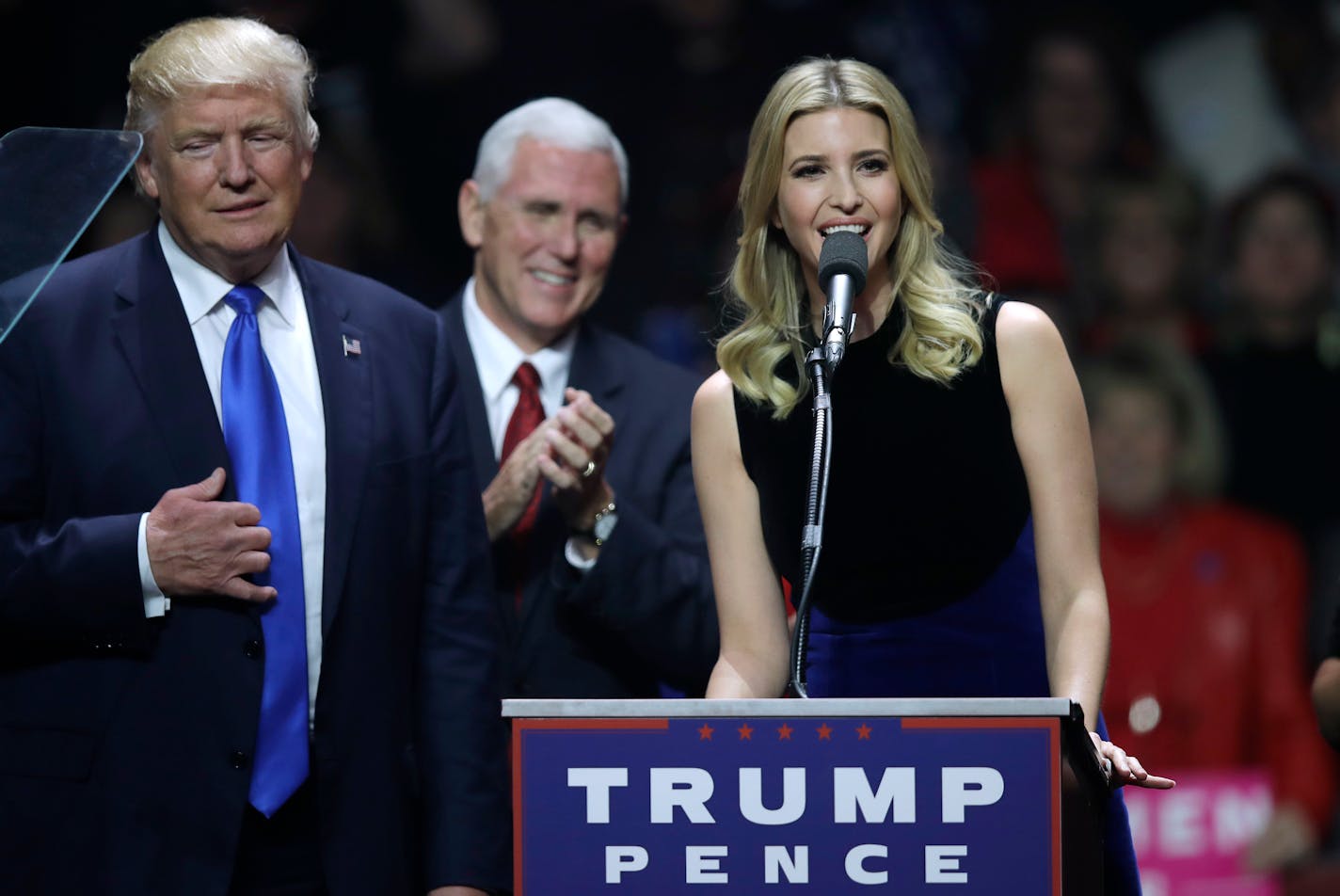 FILE - In this Nov. 7, 2016 file photo, Ivanka Trump speaks beside her father, then-Republican presidential candidate Donald Trump, left, and vice presidential nominee, Indiana Gov. Mike Pence during a campaign rally in Manchester, N.H. Ivanka Trump is poised to give the typically minor role of first daughter a major makeover. After playing an outsize role on the campaign trail for President-elect Donald Trump, the 35-year-old�s next moves are being closely watched. She�s been attending transiti