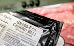Meat labels are seen at a grocery store in Washington, Tuesday, May 19, 2015. A House committee is moving swiftly to get rid of labels on packages of 