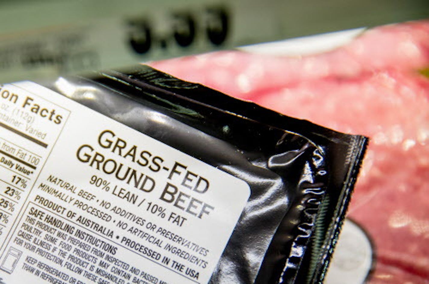 Meat labels are seen at a grocery store in Washington, Tuesday, May 19, 2015. A House committee is moving swiftly to get rid of labels on packages of meat that say where the animals were born, raised and slaughtered. (AP Photo/Andrew Harnik)