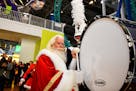 A not-so-good Santa stole beat the drum as the parade circled back to Santa Land. ] MARK VANCLEAVE ï mark.vancleave@startribune.com * Santa Clause pa