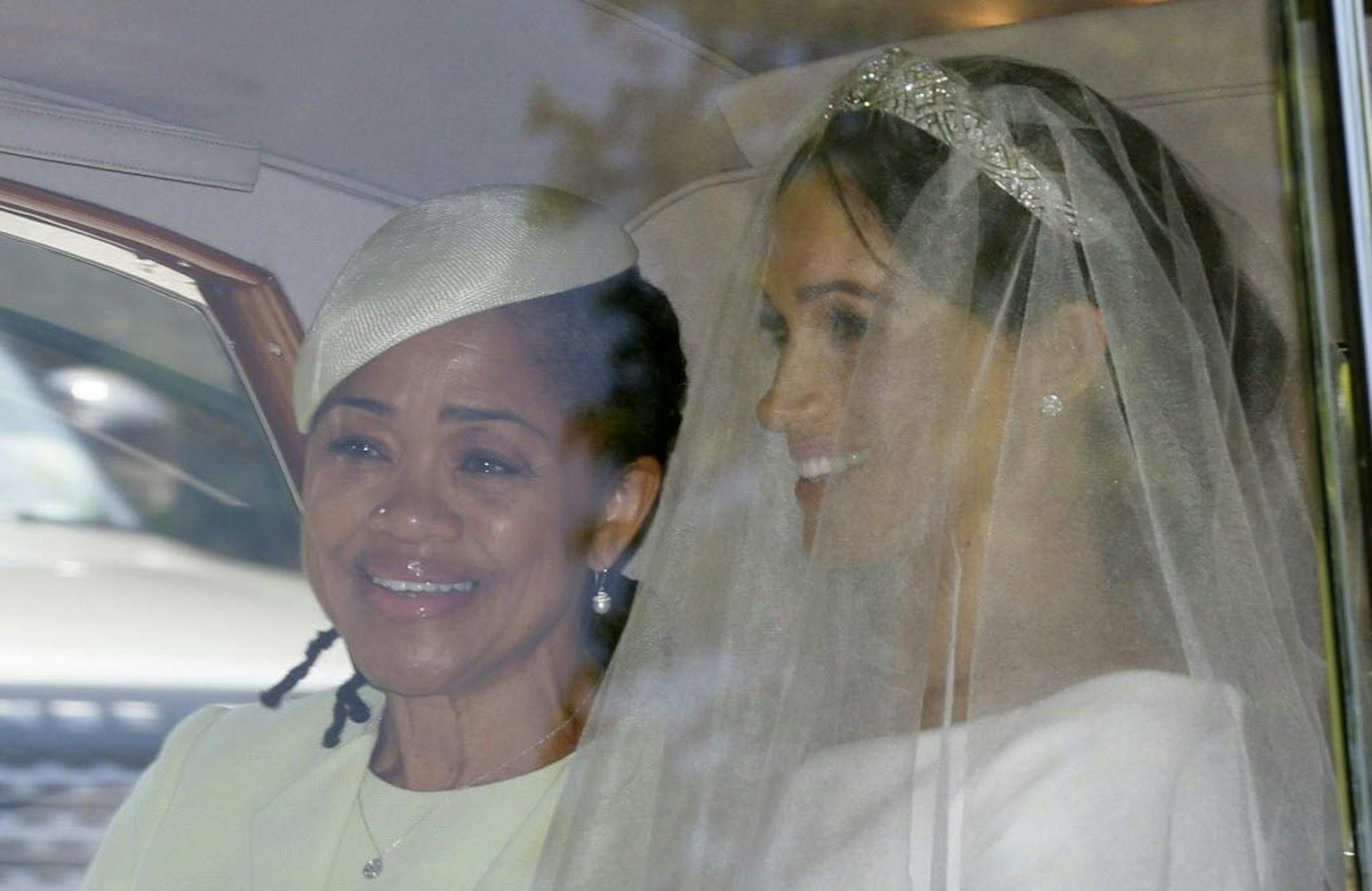 Meghan Markle, right, and her mother Doria Ragland leave Cliveden House Hotel in Taplow, near London, England, Saturday, May 19, 2018 where she stayed before Markle's wedding ceremony with Prince Harry at St. George's Chapel in Windsor Castle.
