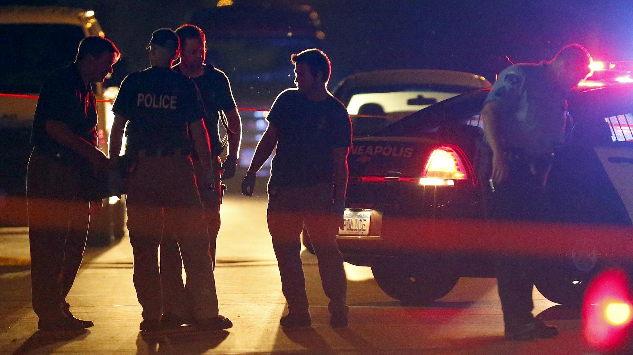 Minneapolis police at the scene of a shooting at the intersection of North 36 th Ave. and Penn Ave. North on Tuesday night. ] CARLOS GONZALEZ cgonzalez@startribune.com June 25, 2013, Minneapolis, Minn. Shooting 36th and Penn North Minneapolis