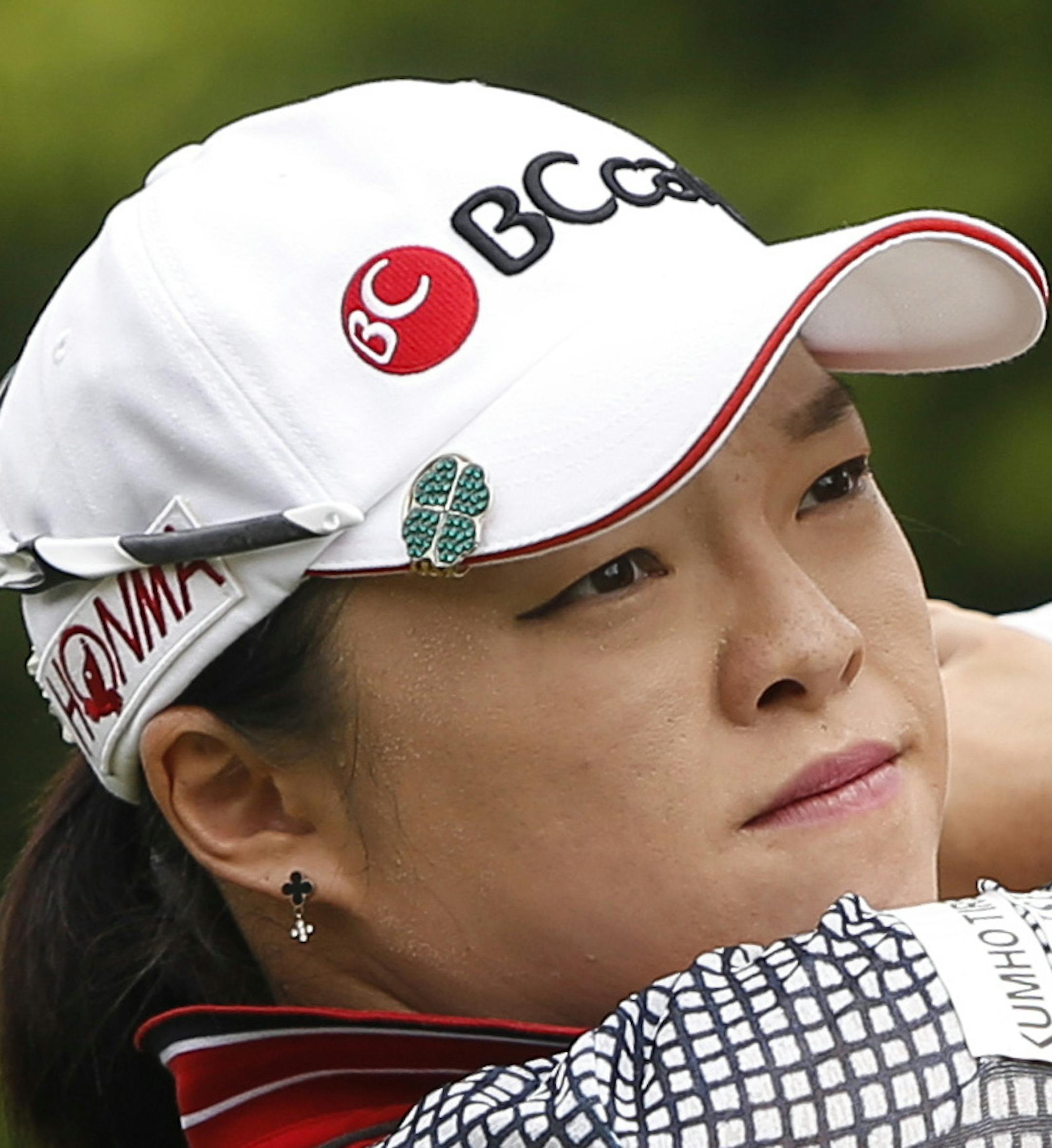 Ha Na Jang of South Korea watches her shot from the sixth hole during the third round of the LPGA Malaysia golf tournament at Kuala Lumpur Golf and Country Club in Kuala Lumpur, Malaysia, Saturday, Oct. 10, 2015. (AP Photo/Joshua Paul)