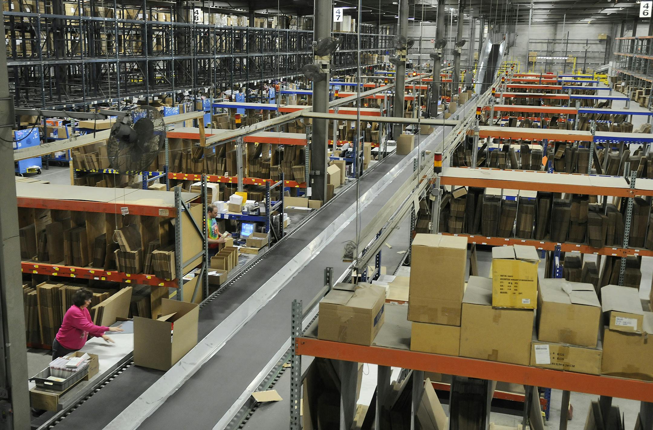 Times photo by Kimm Anderson, kanderson@stcloudtimes.com Workers pack boxes with orders for shipping and move them to a conveyor Wednesday, Mar. 24 at the former Fingerhut Distribution Center which is now controlled by bluestem brands, Inc. Bluestem operates two retail brands: Fingerhut and Gettington.com, an e-commerce brand that launched in the fall.