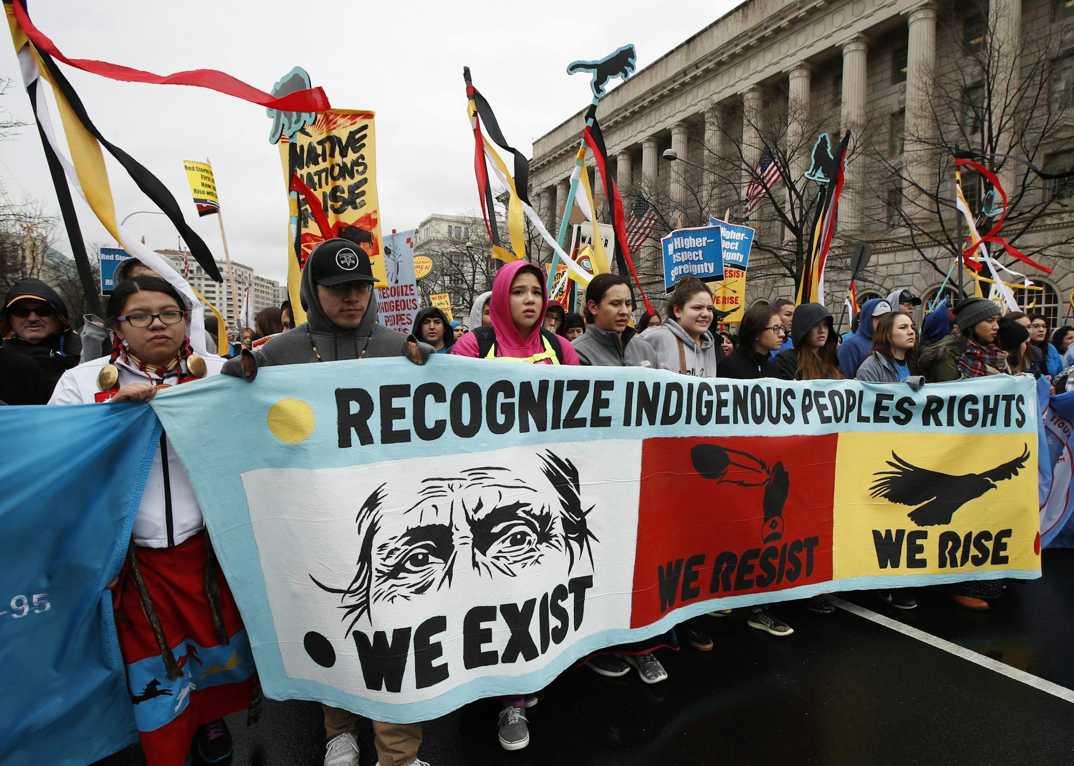 America Indians and their supporters march toward the White House in Washington, Friday, March 10, 2017, to rally against continued construction of the disputed Dakota Access pipeline. (AP Photo/Manuel Balce Ceneta)