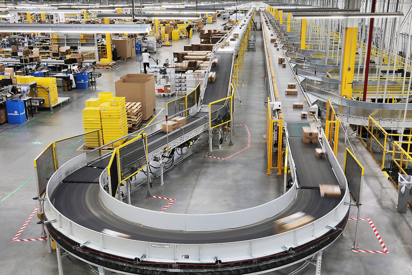 Packages passed down a conveyor bound for delivery trucks at Amazon's fulfillment center in Shakopee.