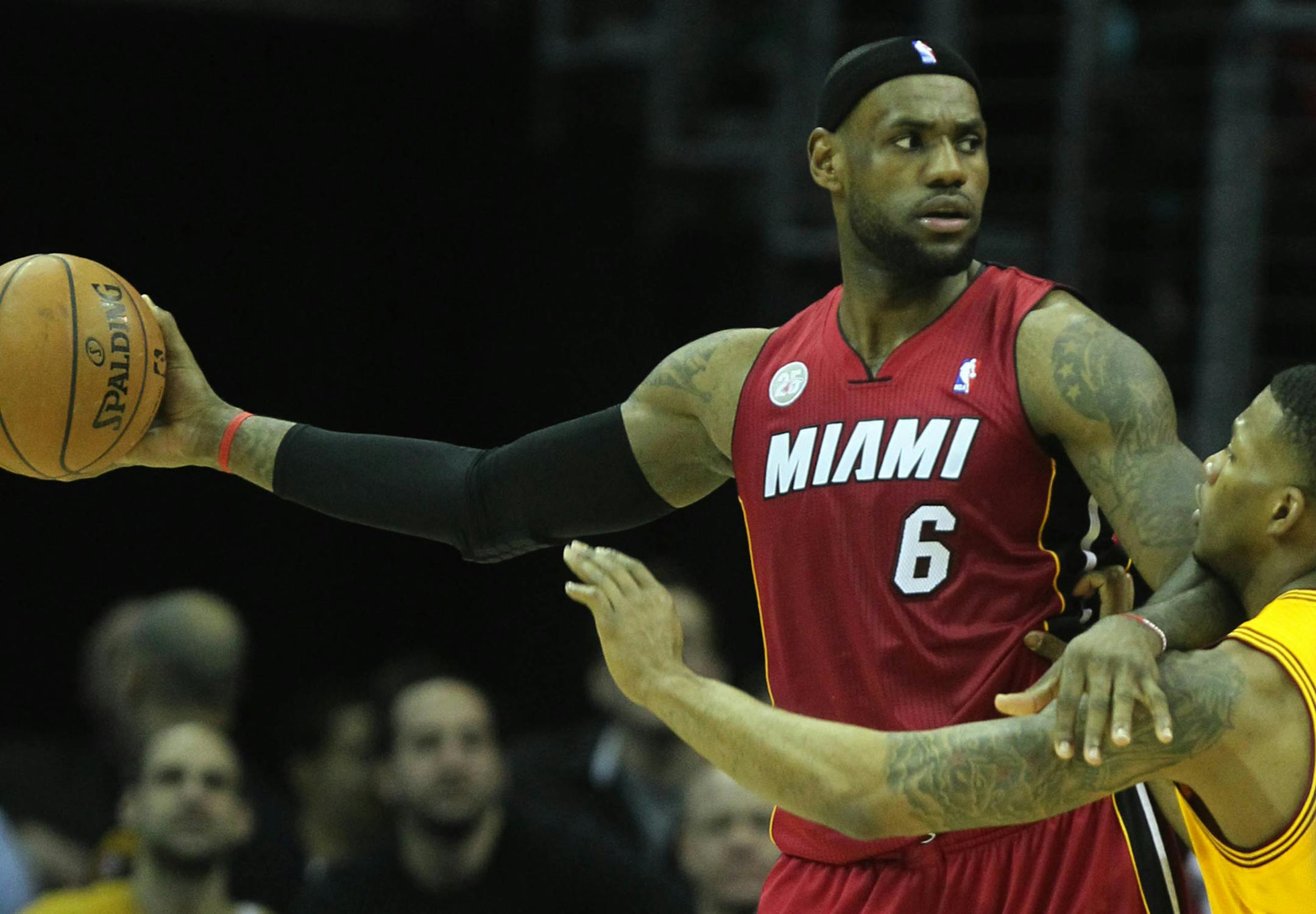 The Cleveland Cavaliers' Alonzo Gee plays tight defense against the Miami Heat's LeBron James (6) during first-quarter action at Quicken Loans Arena in Cleveland, Ohio, on Wednesday, March 20, 2013. (Ed Suba Jr./Akron Beacon Journal/MCT) ORG XMIT: 1136442