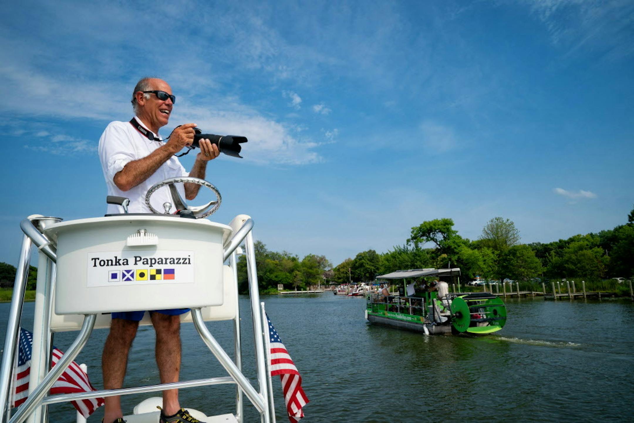 Tom Palm also known as the Tonka Paparazza spends hours on Lake Minnetonka, telephoto in hand, photographing folks on their pontoons, speedboats and Jetskis, then posting pix to his website for free download. It is all paid for by his sponsors. Here he worked near Lord Fletcher�s in Spring Park. ] GLEN STUBBE � glen.stubbe@startribune.com Friday, August 3, 2018