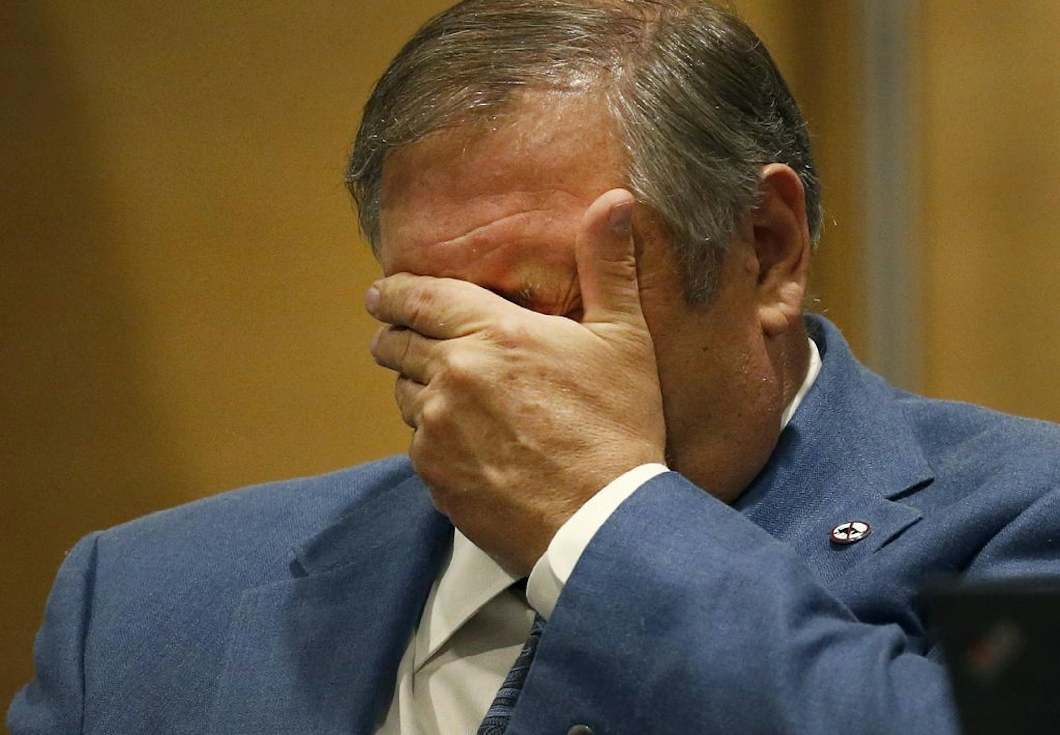 Senate Majority Leader Thomas M. Bakk (DFL) District 03 rubbed his face during the final day of the session.