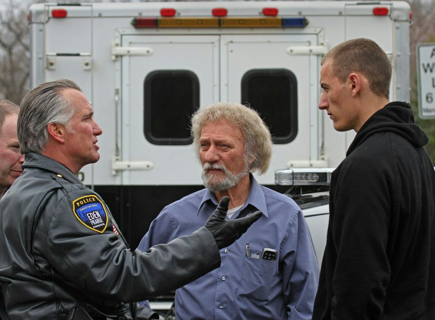 Eden Prairie Police Lt. Jim Morrow talked to Wayne Matula, father of Mandy Matula, and Steven Matula, younger brother of Mandy Matula, at the scene of a police search at Victory Lutheran Church on Eden Prairie Road.