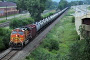 50 million gals of oil a week pass through the Twin Cities from the Bakken. An oil train moves through St Paul, MN July 25, 2014 { tom.wallace@startri