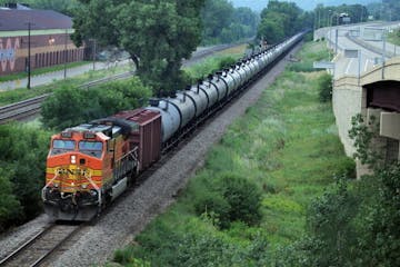 50 million gals of oil a week pass through the Twin Cities from the Bakken. An oil train moves through St Paul, MN July 25, 2014 { tom.wallace@startri