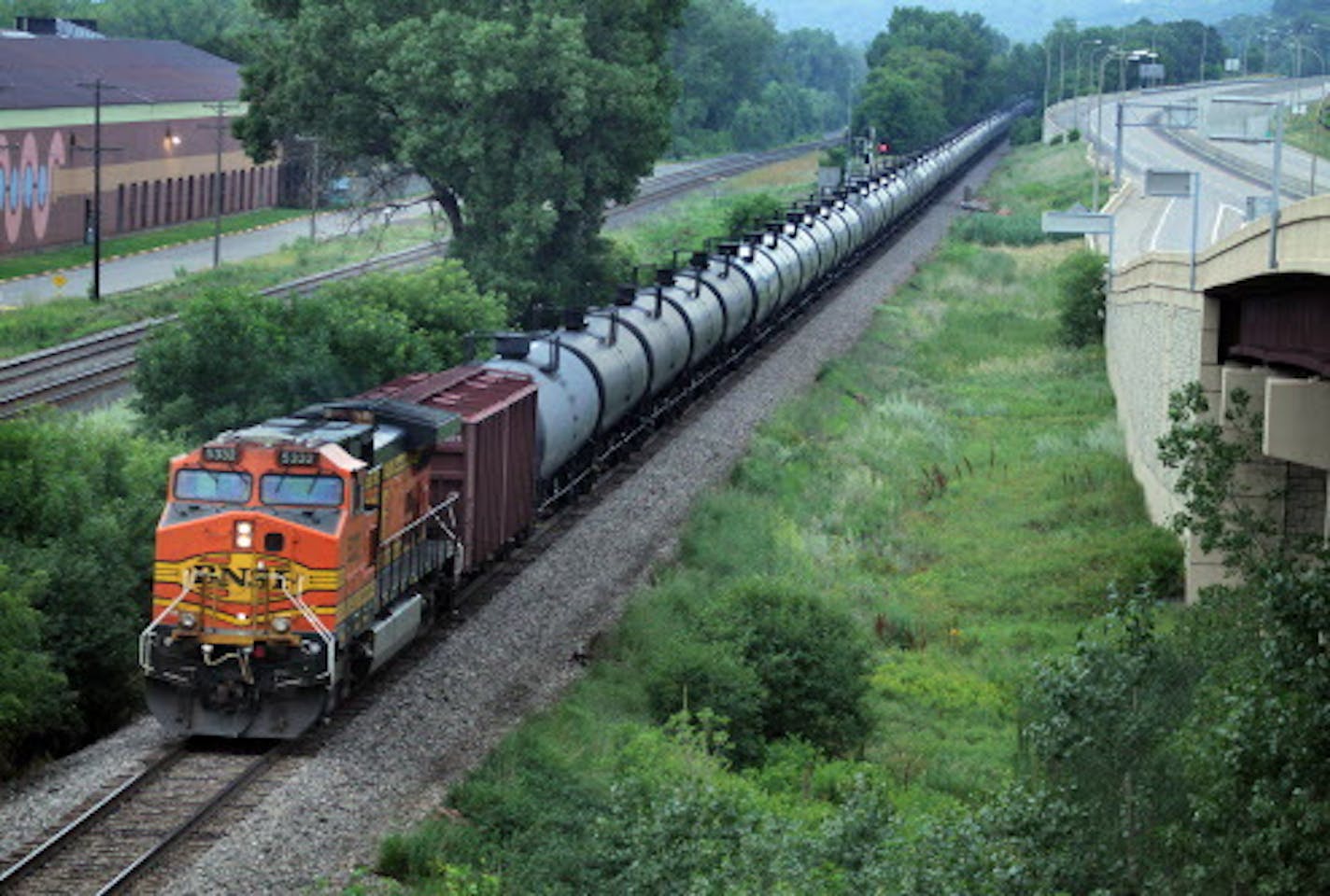 50 million gals of oil a week pass through the Twin Cities from the Bakken. An oil train moves through St Paul, MN July 25, 2014 { tom.wallace@startribune.com train072614