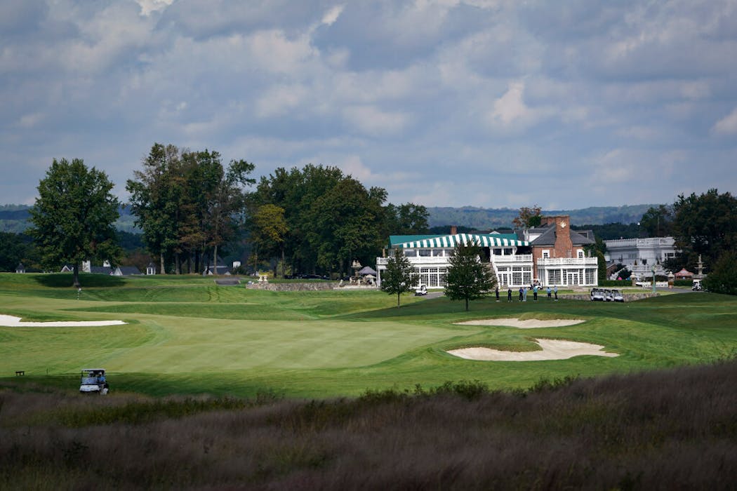 This photo from Friday Oct. 2, 2020, shows golfers playing at Trump National Golf Club in Bedminster, N.J.