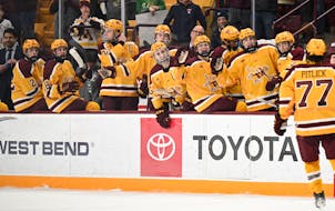 Gophers leading scorer Rhett Pitlick (77) skates to the bench earlier this season. The Gophers speed and scoring punch will be crucial against Nebrask