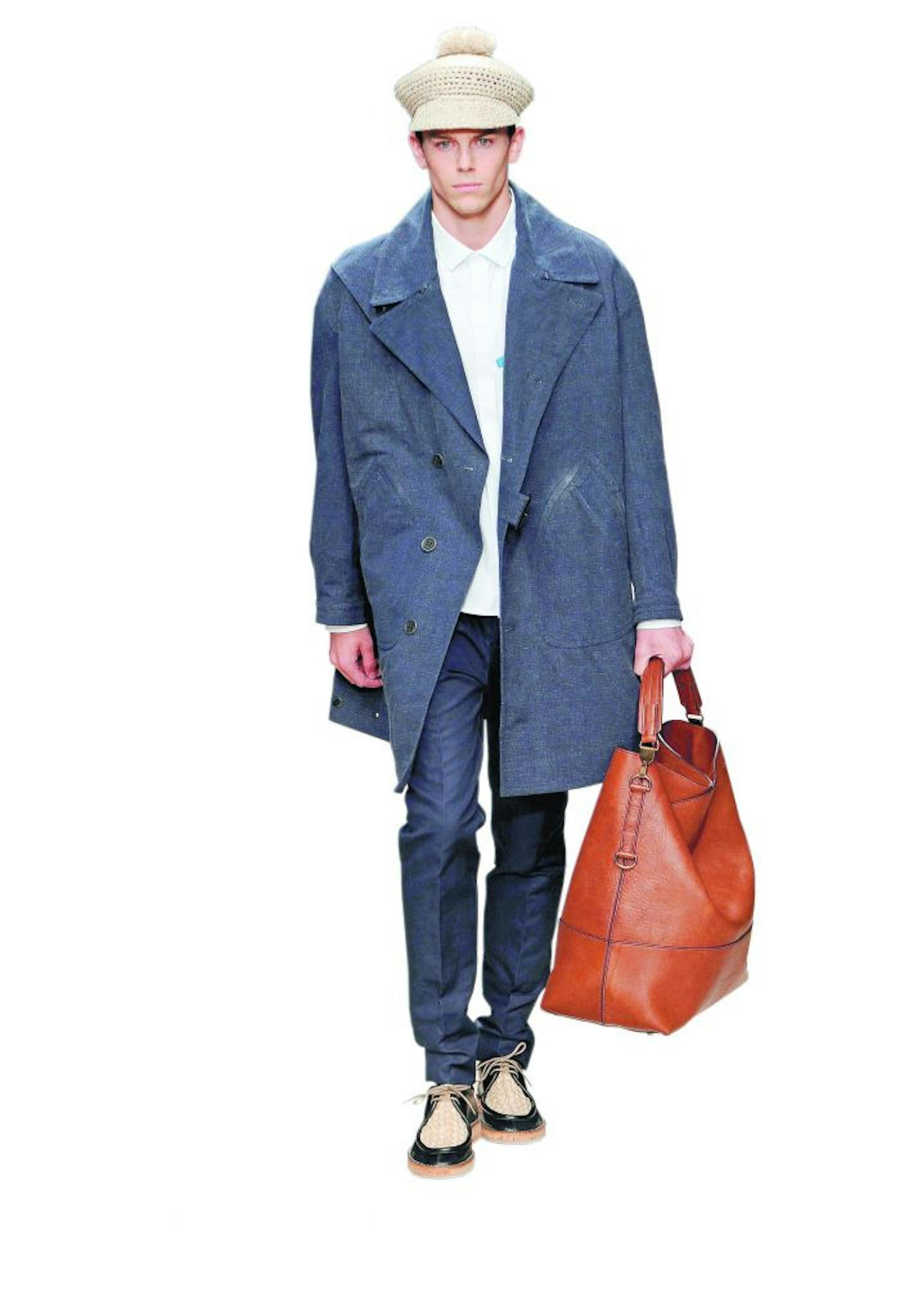 Man-purses were part of Burberry's line of menswear during Milan's Fashion Week earlier this year.