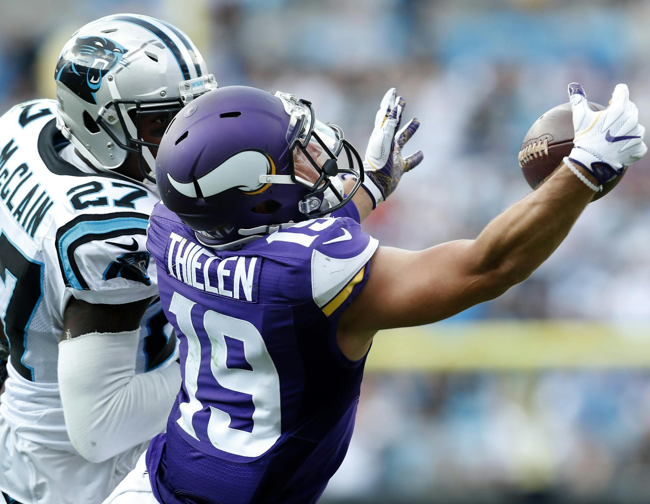Adam Thielen (19) caught a 19-yard pass while being defended by Robert McClain (27) in the fourth quarter. ] CARLOS GONZALEZ cgonzalez@startribune.com - September 25, 2016, Charlotte, NC, Bank of America Stadium, NFL, Minnesota Vikings vs. Carolina Panthers