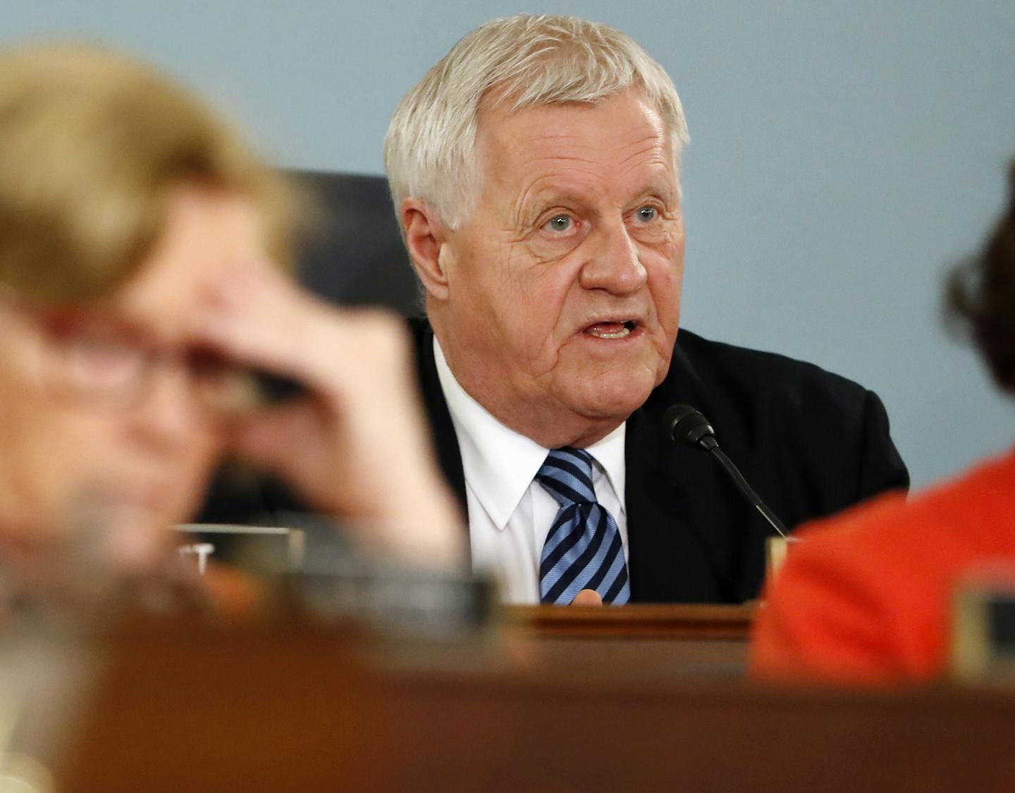 FILE - In this Feb. 27, 2019 file photo, House Agriculture Committee Chairman Rep. Collin Peterson, D-Minn., asks a question on Capitol Hill in Washington. The 2020 election poses a dilemma for conservative Republican voters like Minnesota farmer Jeff Ampe. He likes his incumbent Democratic congressman, Chairman Peterson. He also likes Peterson's leading GOP challenger, former Lt. Gov. Michelle Fischbach. The 75-year-old Peterson says he won't decide until January or February whether he'll seek