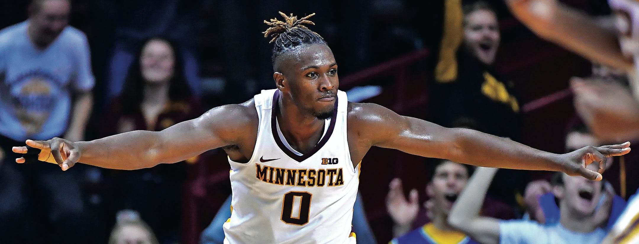 Minnesota Golden Gophers guard Akeem Springs (0) celebrated after hitting his third 3-point shot in a row during the first half against Arkansas Razorbacks. ] (AARON LAVINSKY/STAR TRIBUNE) aaron.lavinsky@startribune.com The University of Minnesota men's basketball team played Arkansas on Tuesday, Nov. 22, 2016 at Williams Arena in Minneapolis, Minn.