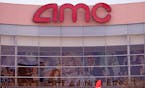 FILE - An AMC movie cinema is shown before opening Friday, Jan. 29, 2021, in Garland, Texas.