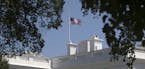 The flag flies at half-staff over the White House in Washington in remembrance of the victims of the mass shooting in Orlando, June 12, 2016. In an ad