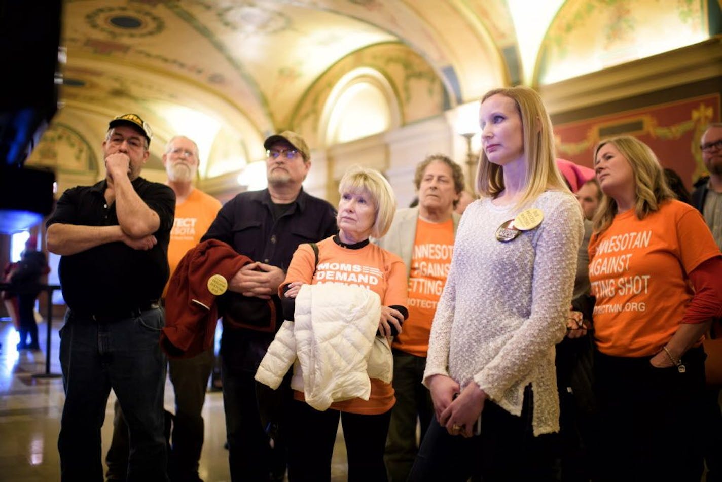 Advocates on both sides of the gun rights issue watched the debate on television screens in the hallway outside the hearing room.