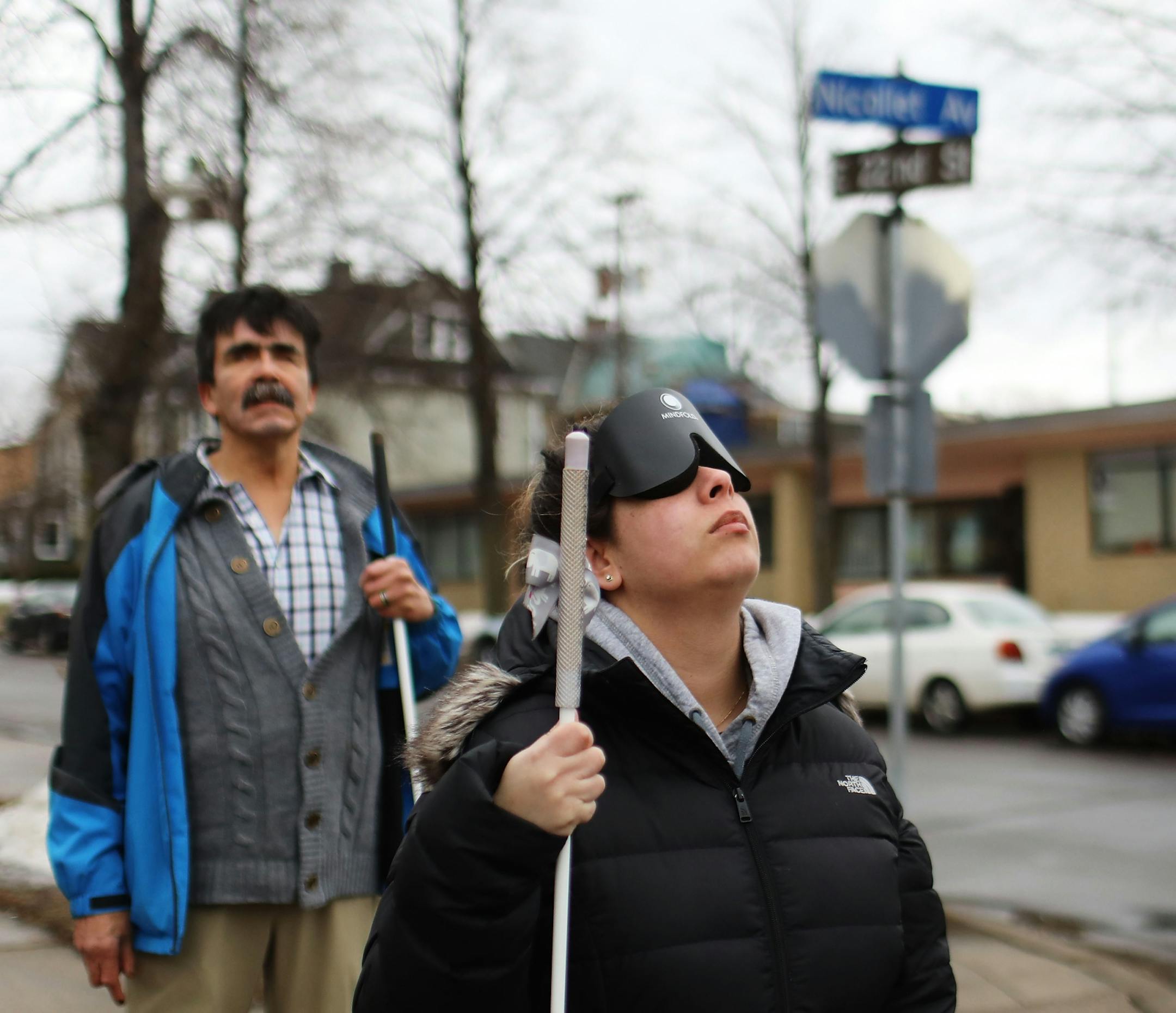 Through a class at Blind, Inc. Angie Castro, 30, is learning to navigate Minneapolis, including crossing busy streets around Blind, Inc. headquarters, near the Minneapolis Art Institute. Castro, wearing a sleep shade, was out with Mark Erickson, cane travel instructor, listening for traffic, before crossing busy Nicollet Ave and familiarizing herself with the city and bus routes Thursday, March 5, 2020, in Minneapolis, MN.