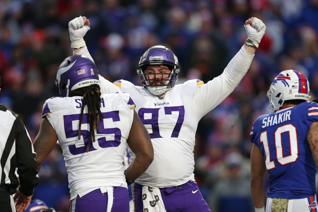 Vikings defensive tackle Harrison Phillips (97) was a force in the middle against his former team. 