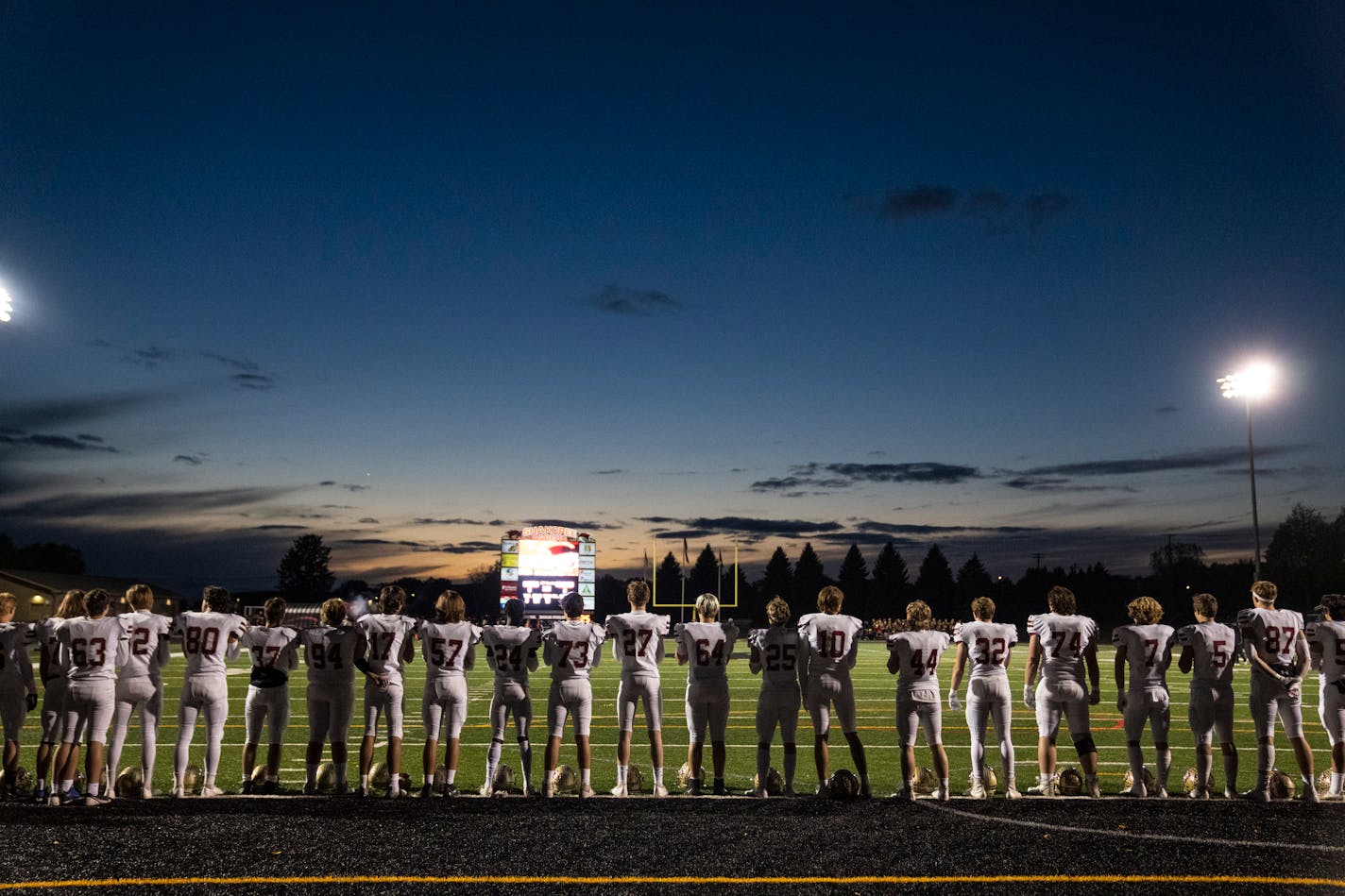 Lakeville South lined up for the National Anthem before the game.