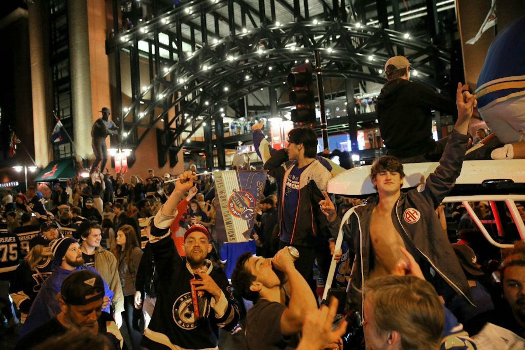 Blues fans celebrated outside Busch Stadium in downtown St. Louis, where one of the watch parties was held for Game 7. (This is the party they didn't have after the Twins beat the Cardinals in game 7 of the 1987 World Series, right?)