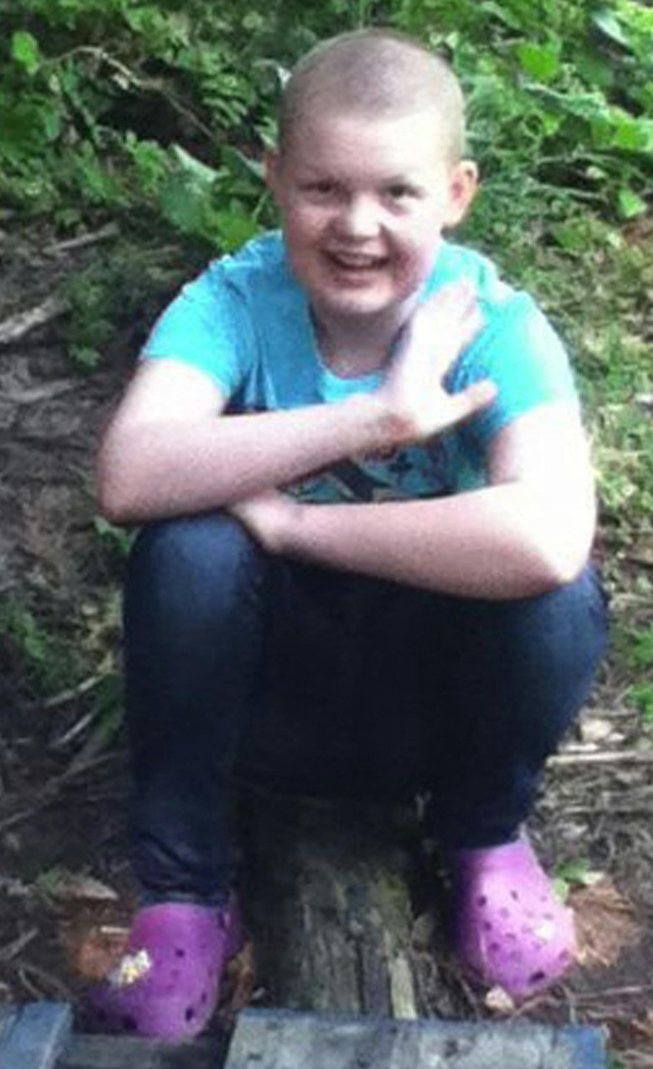 Dr. Jim Olson, pediatric oncologist at Seattle Children's Hospital and research scientist at the Fred Hutchinson Cancer Research Center, was inspired by 10-year-old Violet O'Dell's maturity and grace, and the family's willingness to donate their daughter's brain for research. Violet had a rare, incurable tumor at the base of her brain. (John Lok/Seattle Times/MCT)